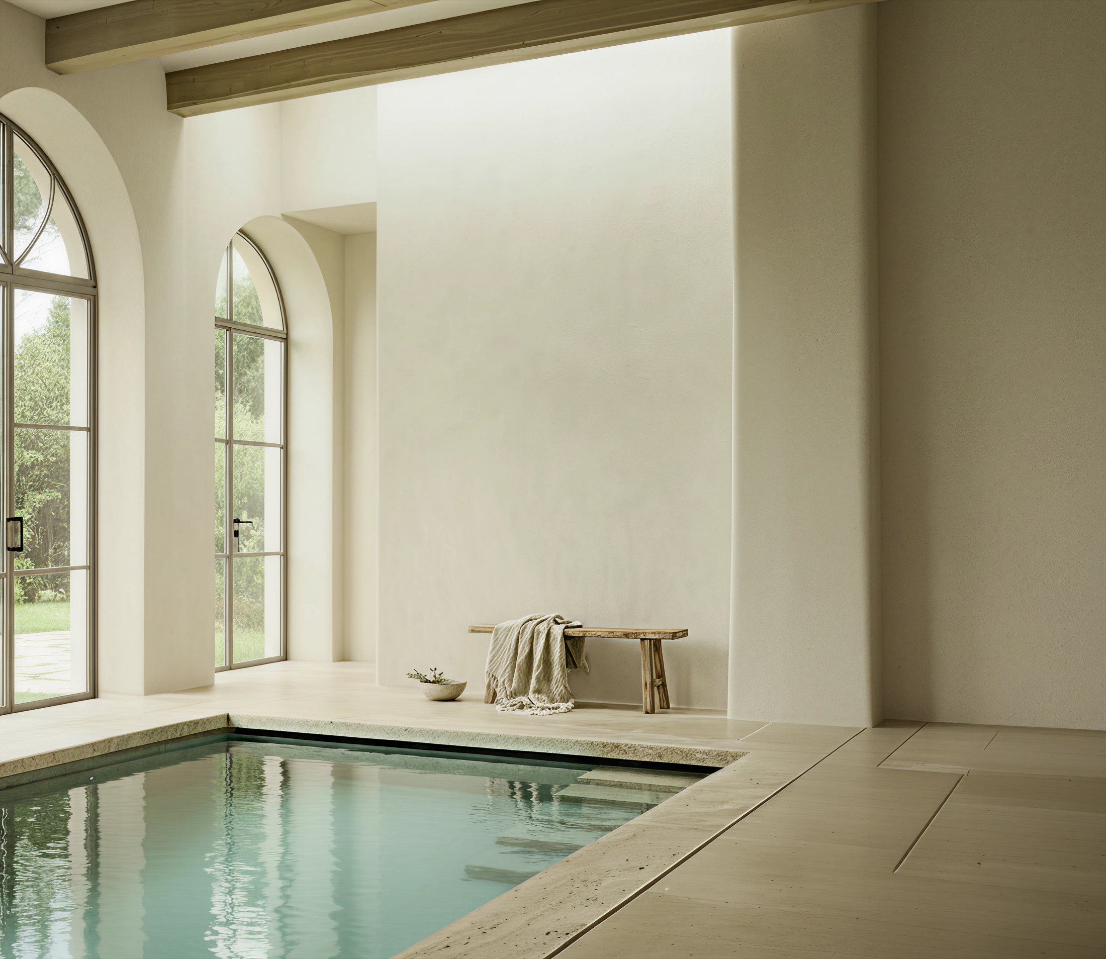 A tranquil candlelit bath beside a sunlit arched window
